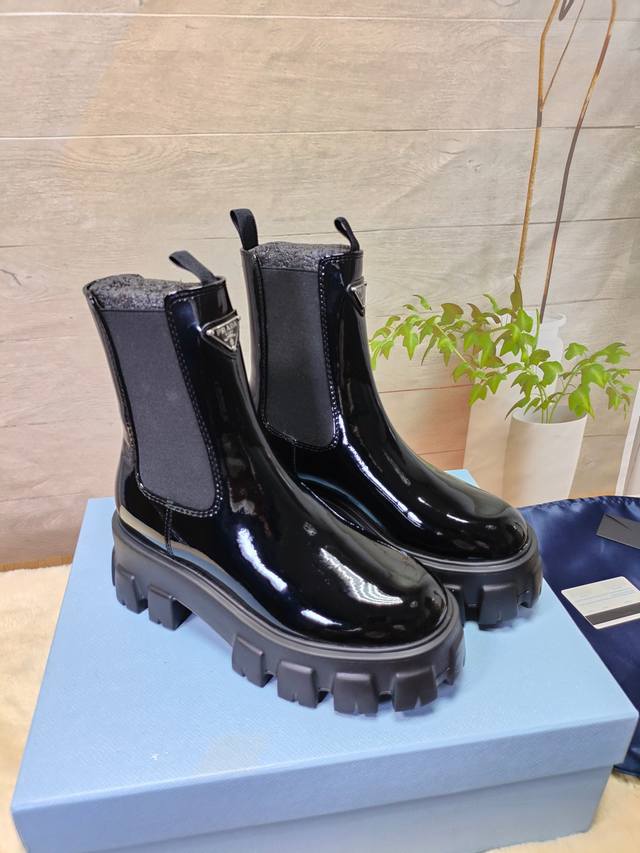 Prada's latest autumn/winter ankle boots. Upper: Imported calfskin. Lining: Impo