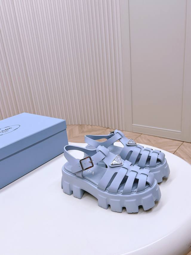 Prada upgraded full-color "Pig Cage" sandals with serrated Roman woven platform