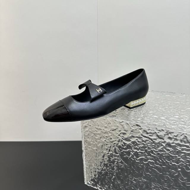 Chanel Mary Jane shoes with pearl heels and bows, perfectly blending classic ele