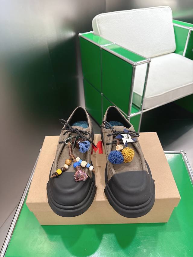 A pair of shoe covers is available for an additional 30 RMB per pair. Camper, a