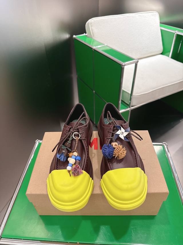 A pair of shoe covers is included, plus an extra 30 for a pair. Camper, a Spanis