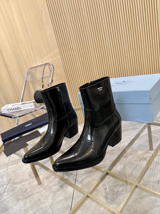 Top-tier luxury version of the classic Prada pointed-toe boots. Prada is perfect