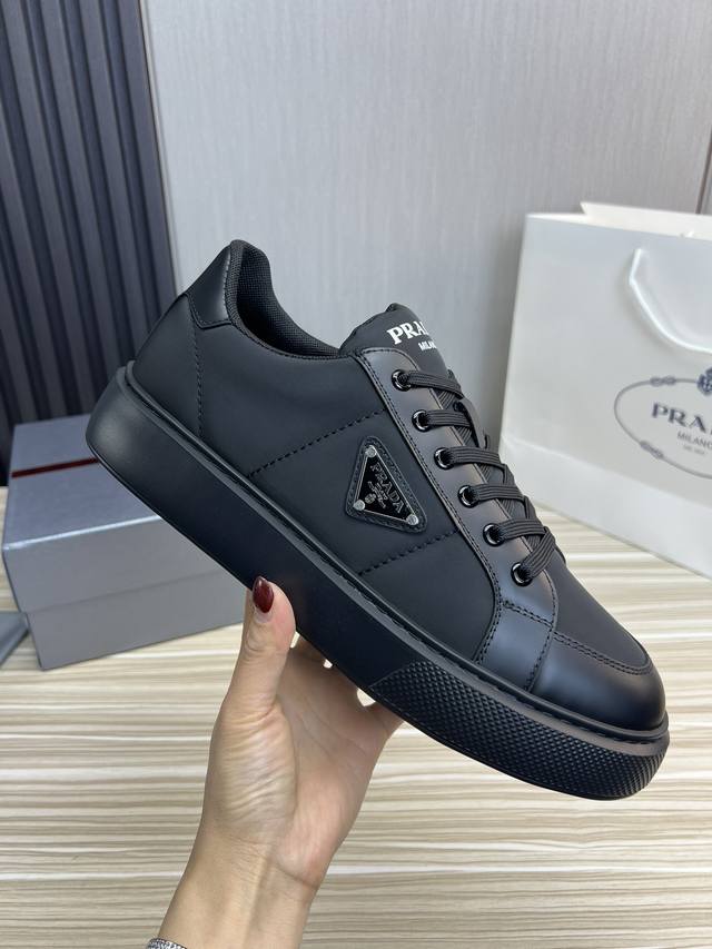 Prada men's shoes, a popular item in boutiques. Made with original cowhide and m