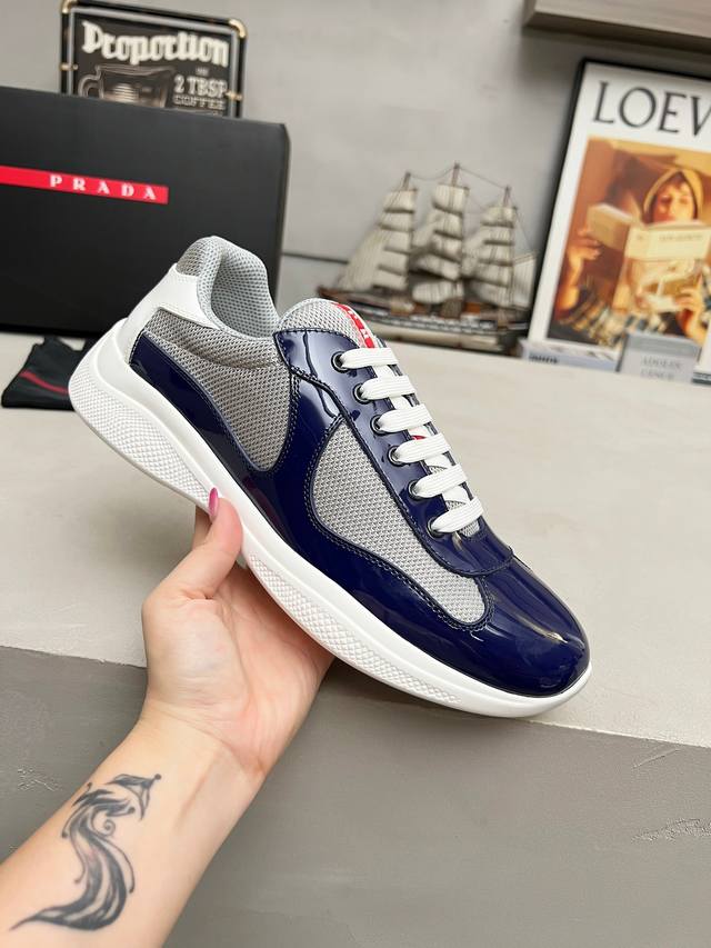Prada top-of-the-line sneakers. Features include an imported flyknit upper with