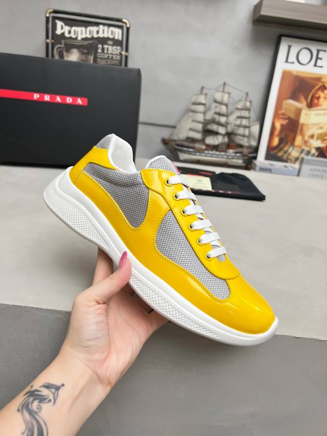 Prada top-of-the-line sneakers. Features include an imported flyknit upper with