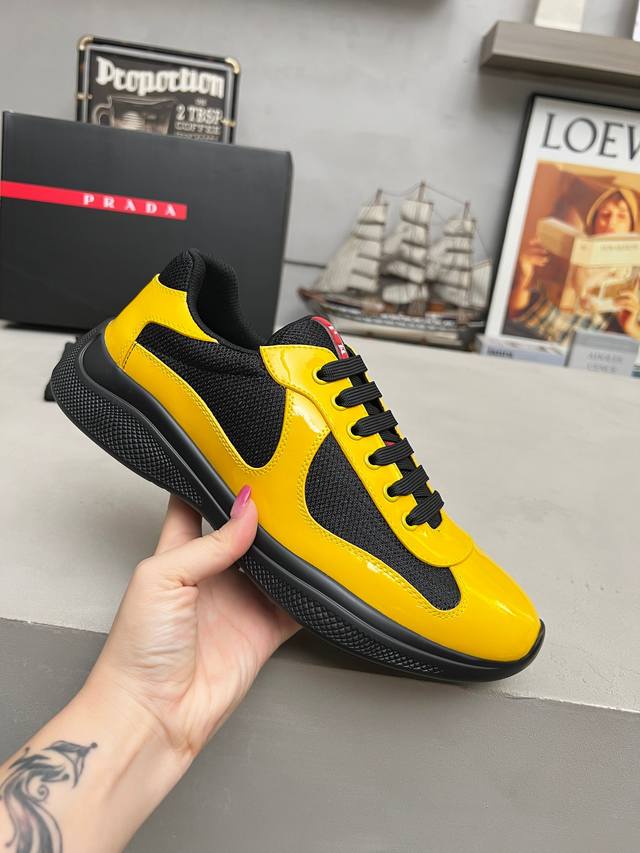 Prada top-of-the-line sneakers. Features include an imported flyknit upper with