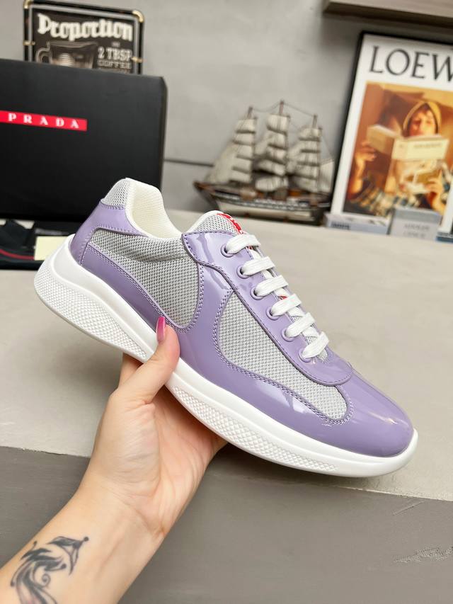 Prada top-of-the-line sneakers. Features include an imported flyknit upper with