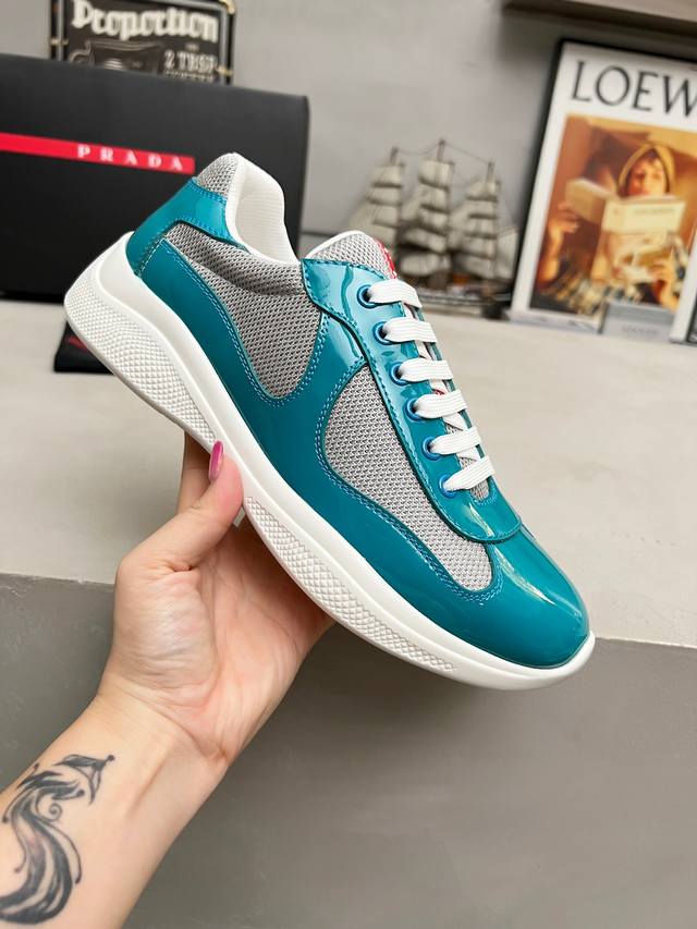 Prada top-of-the-line sneakers. Features include an imported flyknit upper with