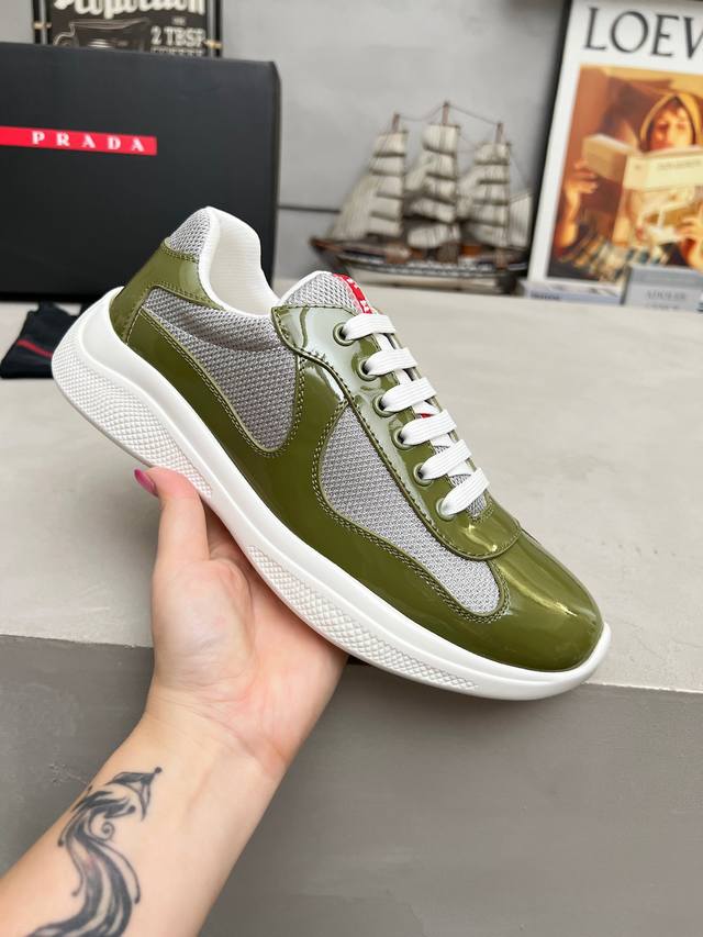 Prada top-of-the-line sneakers. Features include an imported flyknit upper with