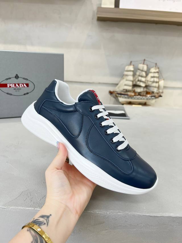 Prada top-of-the-line sneakers. Features include an imported flyknit upper with