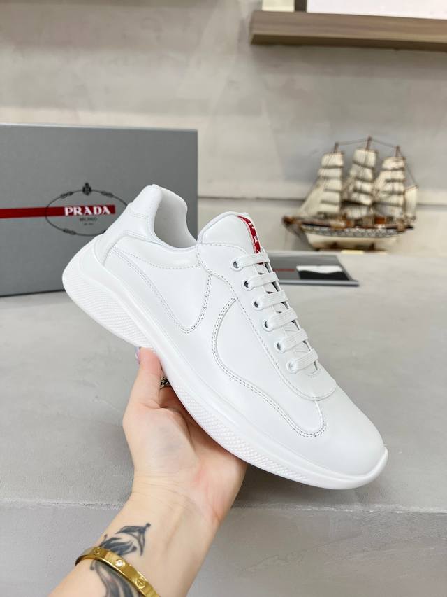 Prada top-of-the-line sneakers. Features include an imported flyknit upper with