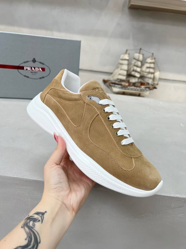 Prada top-of-the-line sneakers. Features include an imported flyknit upper with