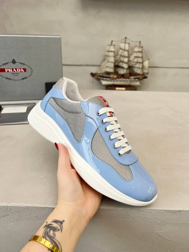 Prada top-of-the-line sneakers. Features include an imported flyknit upper with