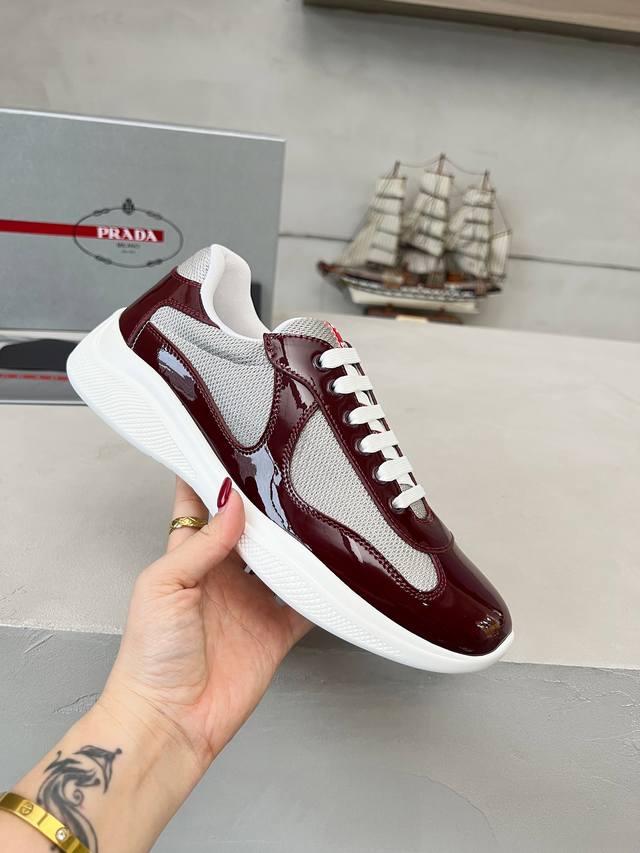 Prada top-of-the-line sneakers. Features include an imported flyknit upper with
