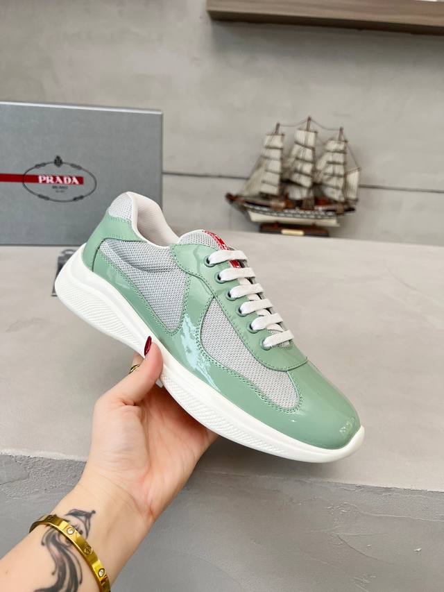 Prada top-of-the-line sneakers. Features include an imported flyknit upper with