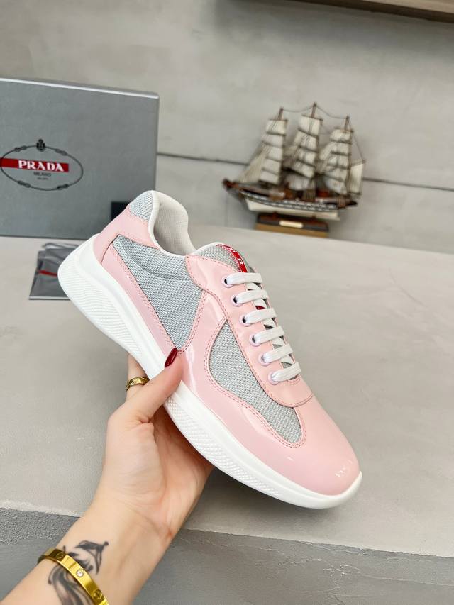 Prada top-of-the-line sneakers. Features include an imported flyknit upper with