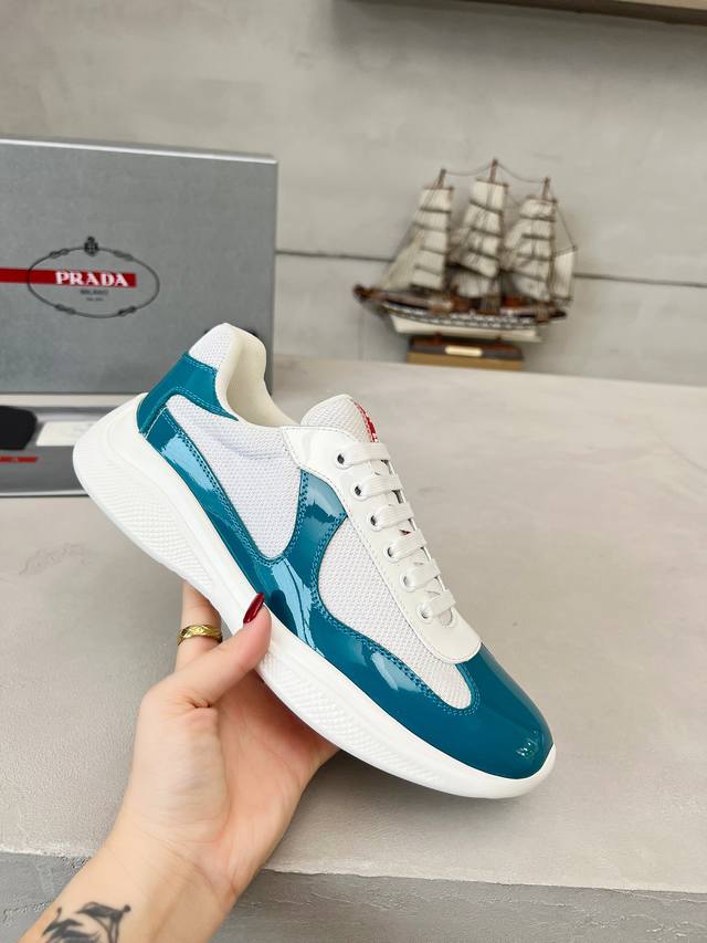 Prada top-of-the-line sneakers. Features include an imported flyknit upper with