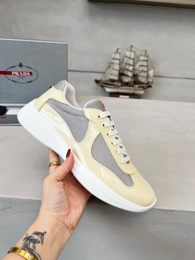 Prada top-of-the-line sneakers. Features include an imported flyknit upper with