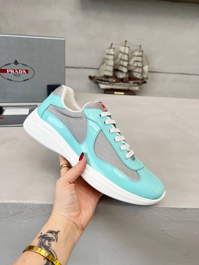 Prada top-of-the-line sneakers. Features include an imported flyknit upper with