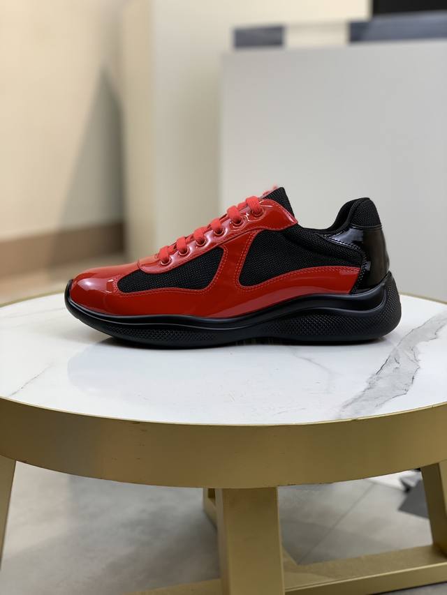 Prada top-of-the-line sneakers. Features include an imported flyknit upper with