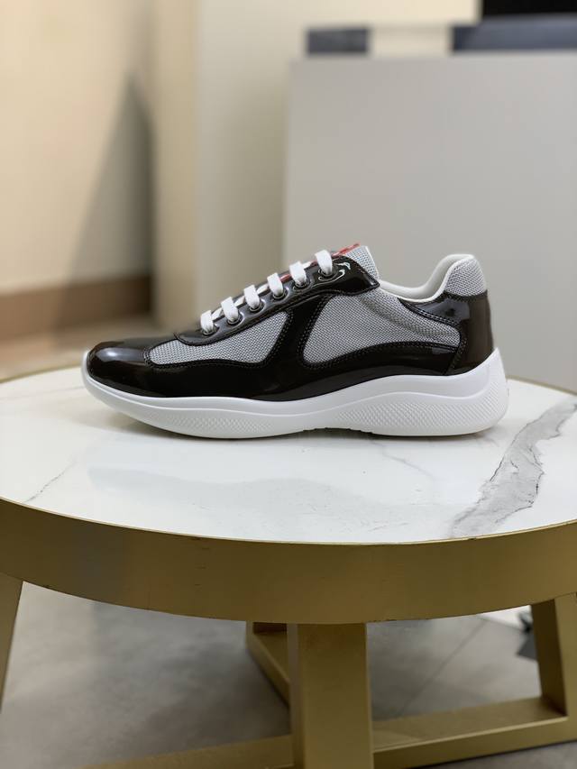 Prada top-of-the-line sneakers. Features include an imported flyknit upper with