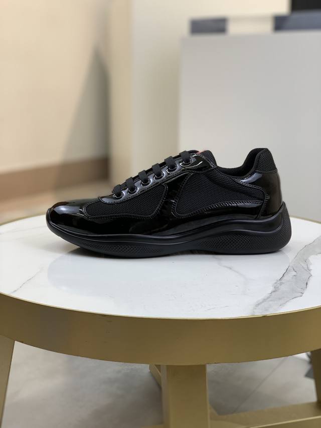 Prada top-of-the-line sneakers. Features include an imported flyknit upper with