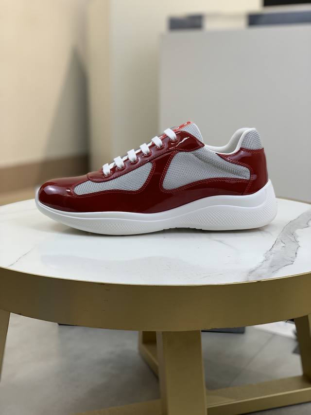 Prada top-of-the-line sneakers. Features include an imported flyknit upper with