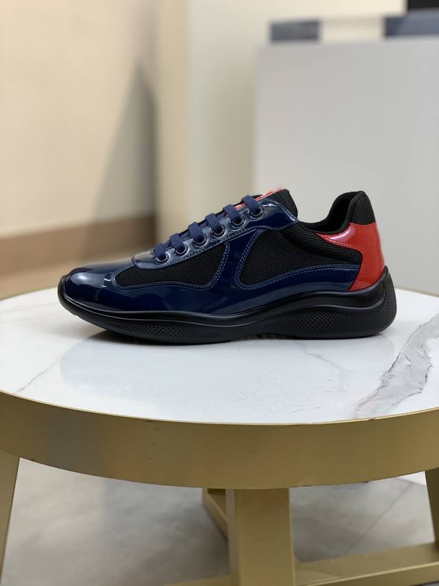 Prada top-of-the-line sneakers. Features include an imported flyknit upper with