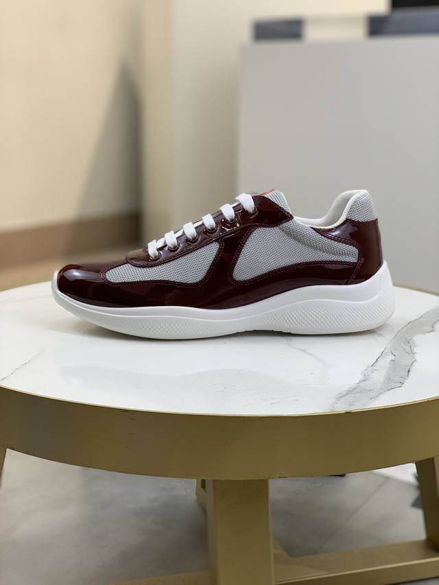 Prada top-of-the-line sneakers. Features include an imported flyknit upper with