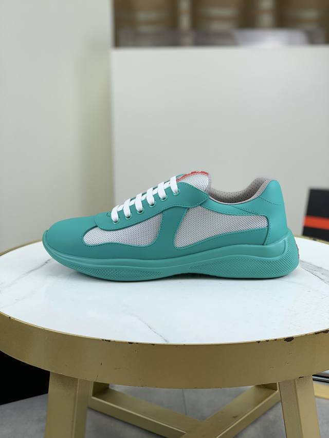 Prada Top-Tier Sneakers. Upper: Imported flyknit fabric combined with soft rubbe