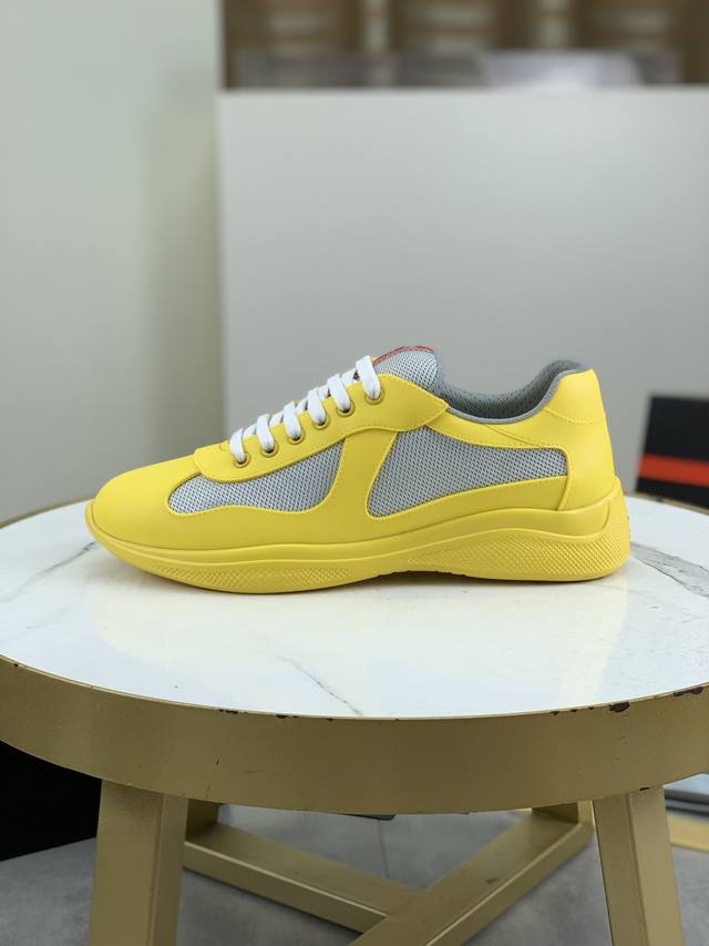 Prada Top-Tier Sneakers. Upper: Imported flyknit fabric combined with soft rubbe