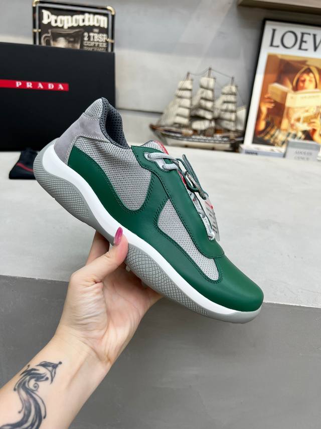 Prada top-of-the-line sneakers. Features include an imported flyknit upper with