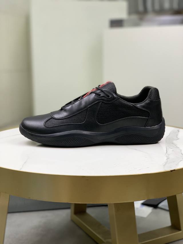 Prada top-of-the-line sneakers. Features include an imported flyknit upper with