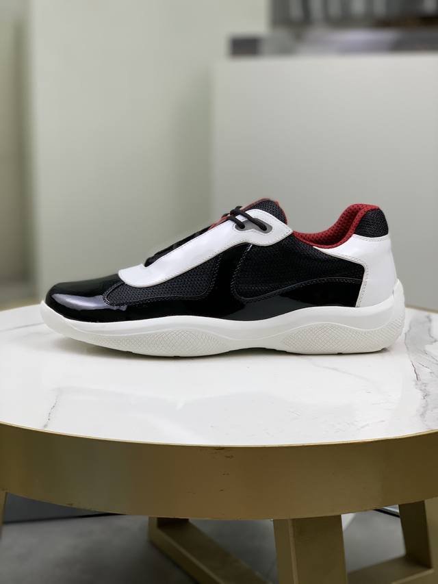 Prada top-of-the-line sneakers. Features include an imported flyknit upper with