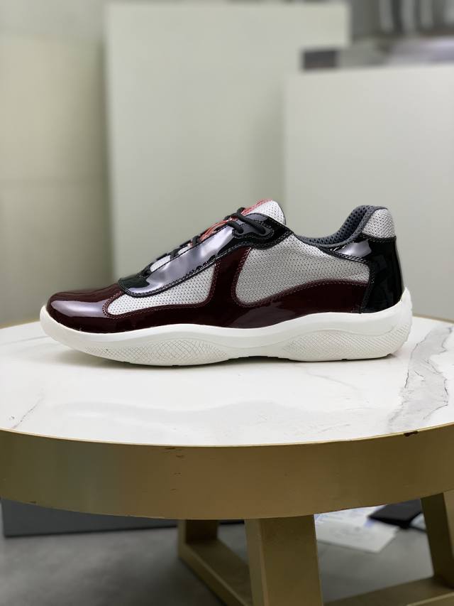 Prada top-of-the-line sneakers. Features include an imported flyknit upper with