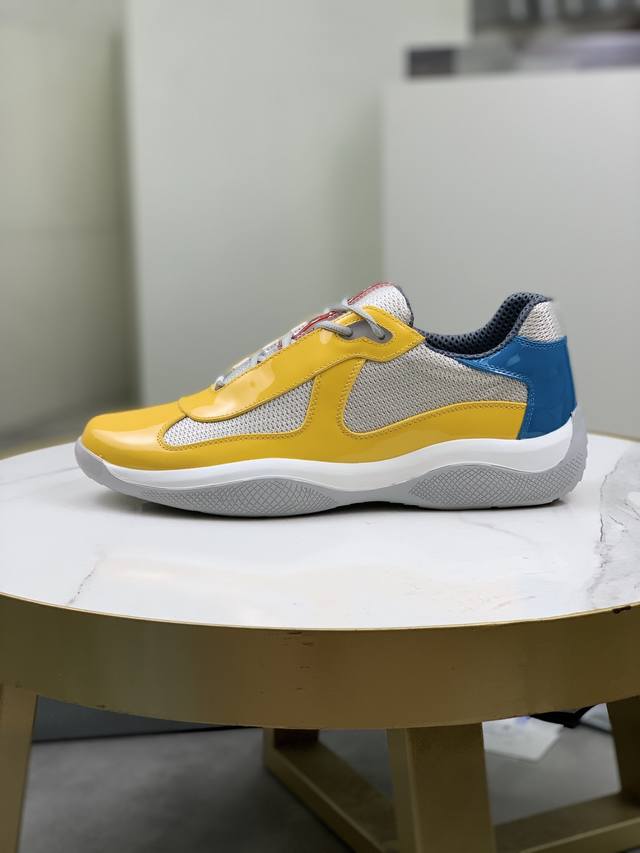 Prada top-of-the-line sneakers. Features include an imported flyknit upper with