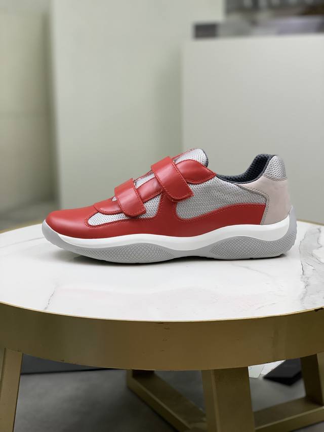 Prada top-of-the-line sneakers. Features include an imported flyknit upper with