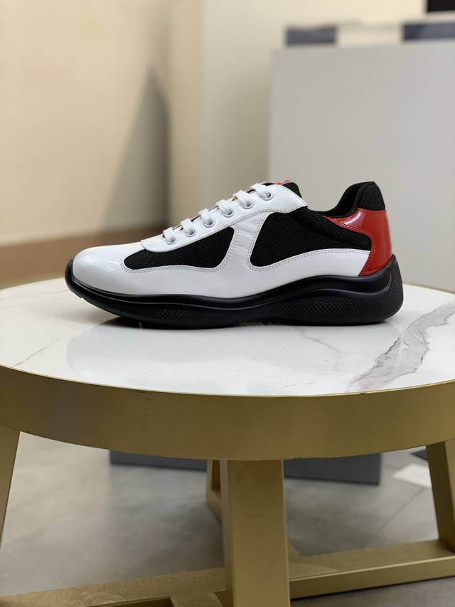 Prada top-of-the-line sneakers. Features include an imported flyknit upper with