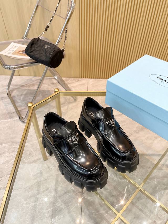Prada's new black platform calfskin casual shoes with open-toe beading and a thi