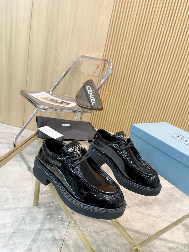 Prada Fall/Winter runway show and influencer-endorsed loafers. Prada's "Dream Ci