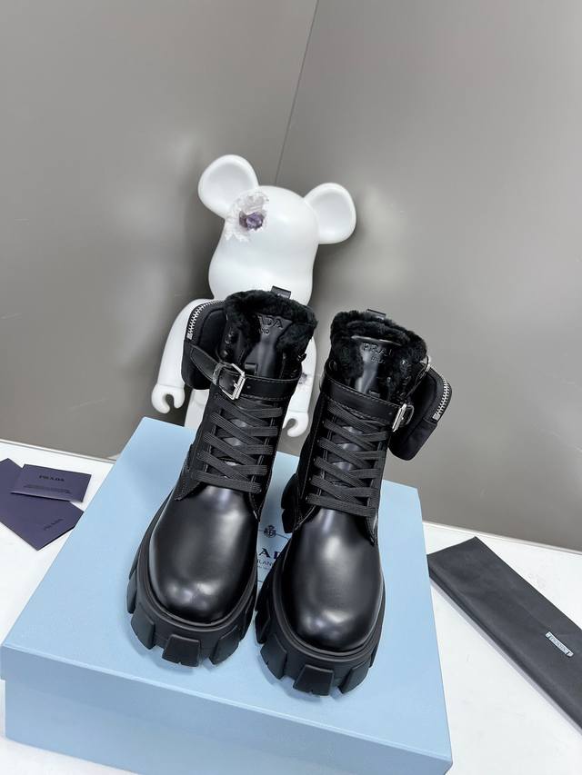 Prada's newest wool ankle boots with a thick sole, part of the Prada Spring/Summ