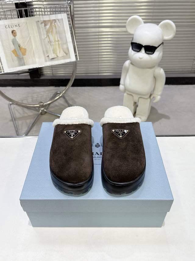 Prada's popular Fall/Winter closed-toe sheepskin slippers. A runway item, suitab