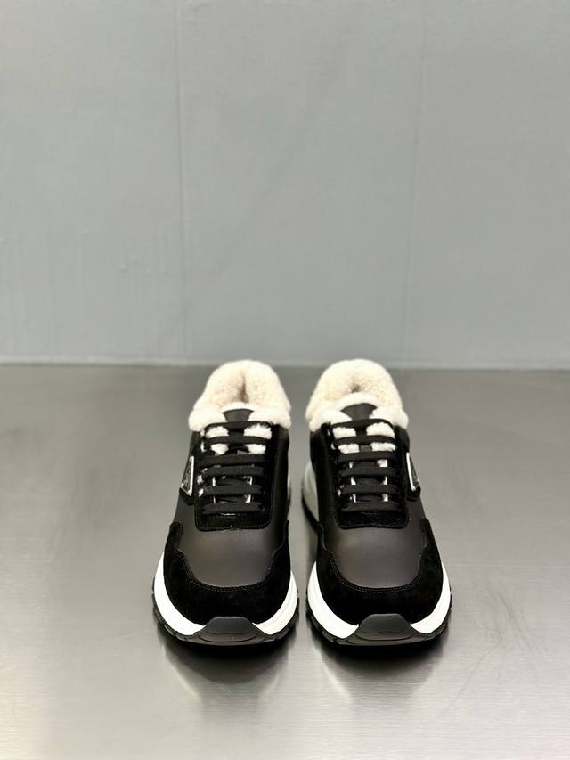 Prada Men's New Wool Sneakers These sneakers present a modern silhouette, reint