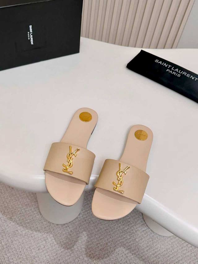 Actual Price: Yves Saint Laurent (YSL) - This is a women's slipper. It features