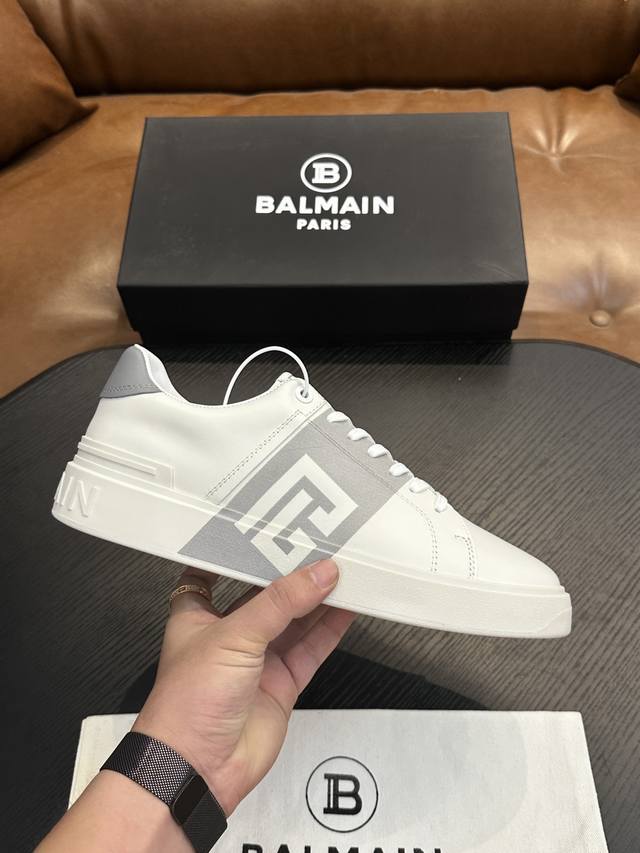 Balmain B-Skate Sneakers B-Skate multi-material color-blocked sneakers, featurin