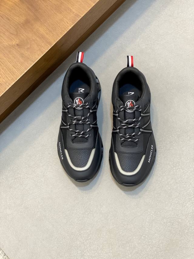 Moncler Men's Sneakers, crafted from imported cowhide leather and neoprene, feat