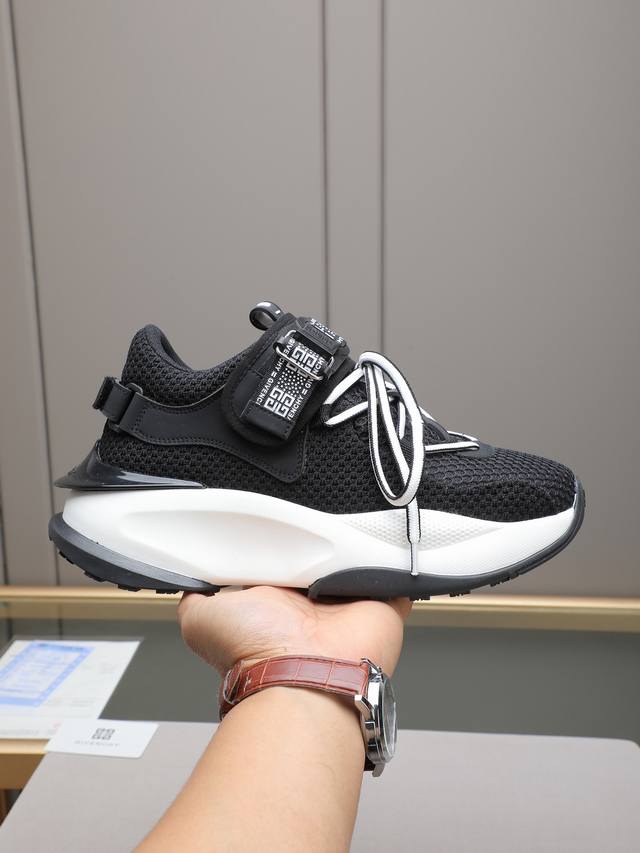 Givench*. Men's platform casual shoes, crafted from imported calfskin and mesh,