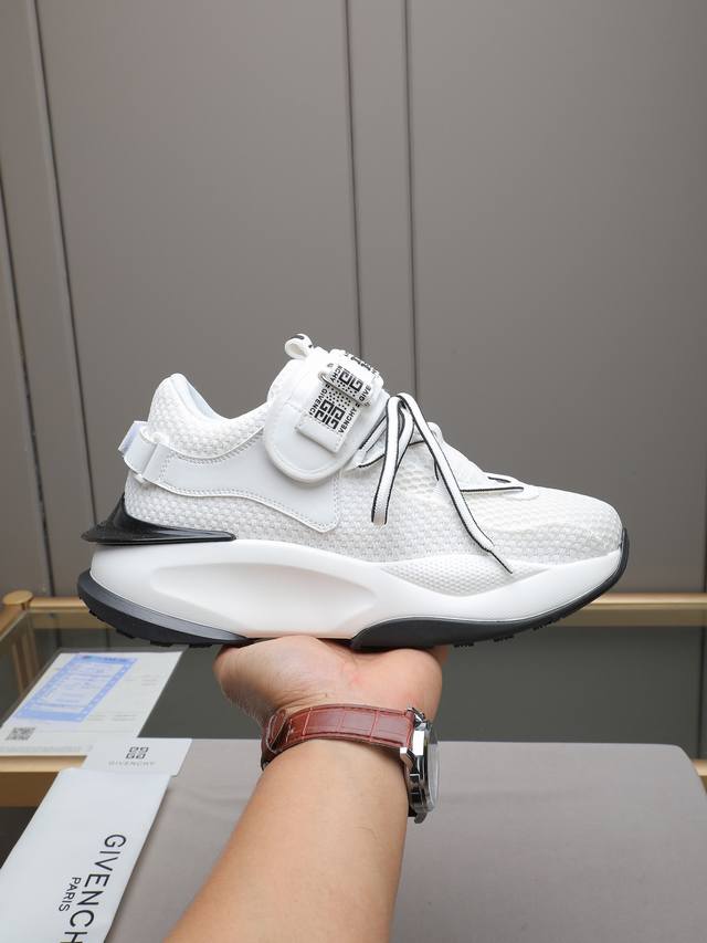 Givench*. Men's platform casual shoes, crafted from imported calfskin and mesh,