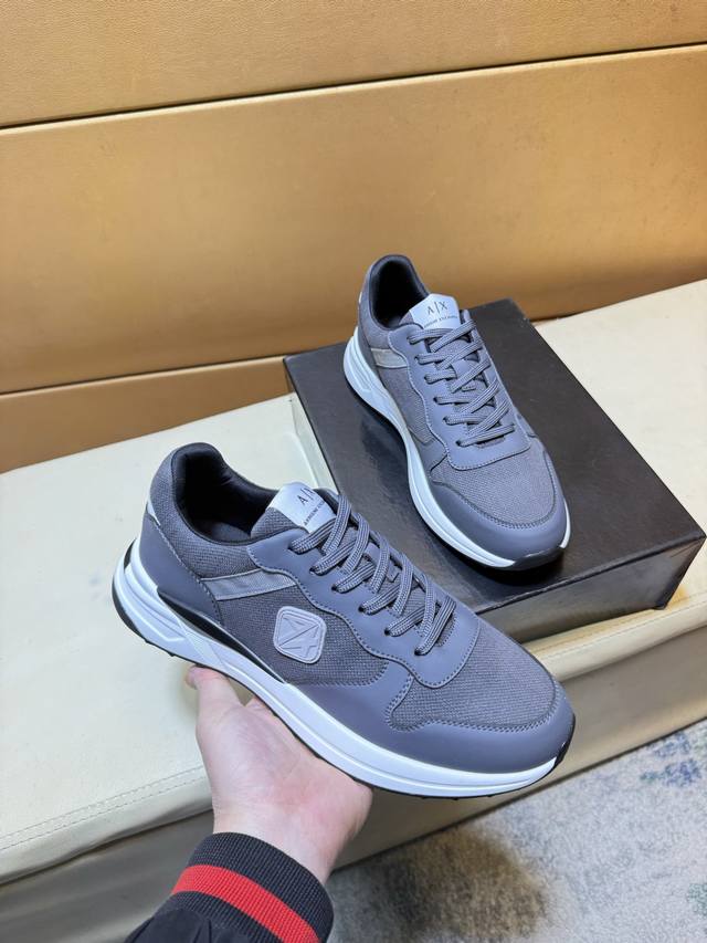 Exclusive first release of Armani's unique modern style sneakers. Casual Italian