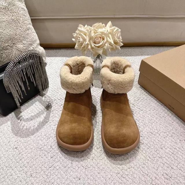 Ugg Women's Upgraded Platform Wool Boots are a must-have! The epitome of effortl